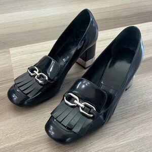 Michael Kors loafer style black  heels. In great condition. Size 8.